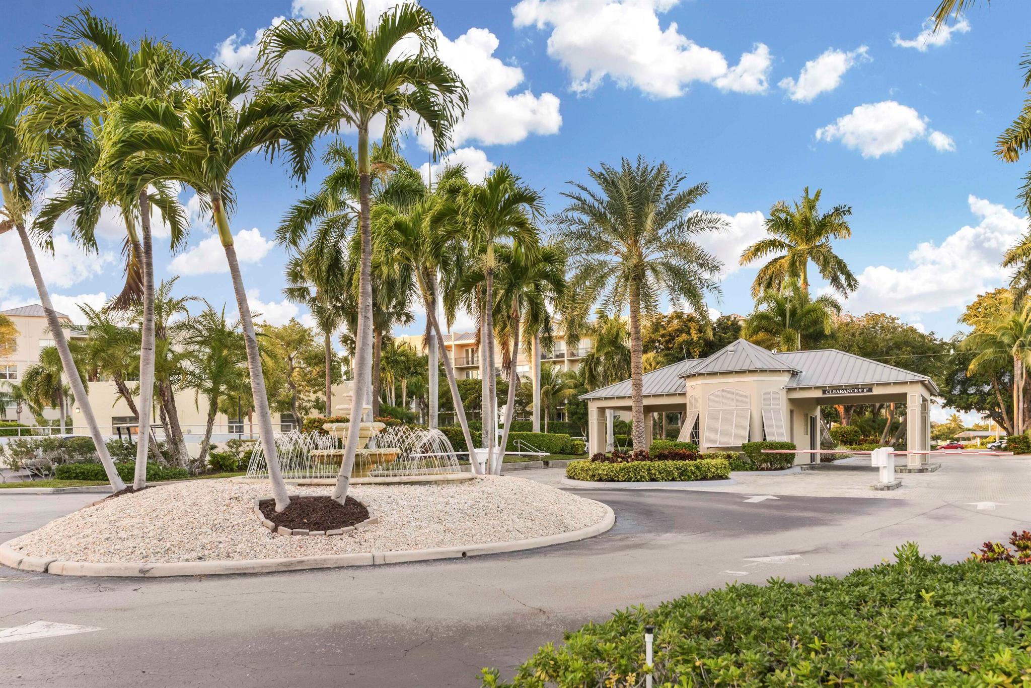 Experience luxury waterfront living at Boca Bayou, one of East Boca's premier gated communities. Set on 46 acres of beautifully landscaped grounds, Boca Bayou offers a true resort experience with 5 heated pools, tennis, pickleball, 2 fitness centers, saunas, bocce, shuffleboard, billiards, grilling stations, a clubhouse with Wi-Fi, and even car wash stations, all secured by 24-hour manned gates. Boaters enjoy private canals with direct access to the Intracoastal & Ocean, making this community a true paradise for waterfront living.This completely renovated first-floor unit combines modern luxury with the ease of direct water access. From your private screened-in patio, enjoy tranquil canal views framed by lush greenery and a private 26-ft dock, ready for your ocean adventures. This newly