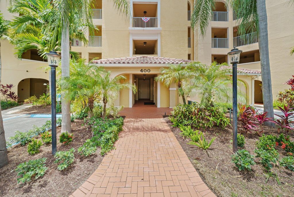 Photo of 400 Uno Lago Drive #205, Juno Beach, FL 33408 (MLS # R10813316)