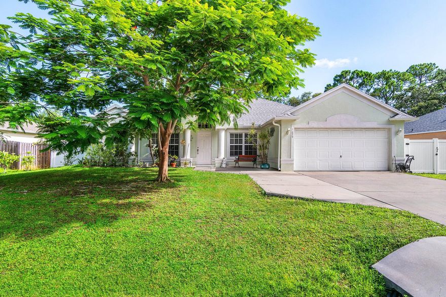 Impressive 4-Bedroom Home with Modern Upgrades & No HOA! Step into comfort in this spacious 4-bedroom, 2-bathroom home with high ceilings, porcelain tile, and an open layout ideal for entertaining and natural light. The split floor plan offers spacious bedrooms and bathrooms. Enjoy serene outdoor living with a fenced backyard, pet friendly, fruit trees, covered patio, and tranquil canal view that provide both privacy and relaxation.  Recent updates include a 2021 ROOF, 2024 A/C, and kitchen appliances installed just four years ago. Additional highlights: a 2-car garage with attic access stairs, a backyard shed & gutter.  Conveniently located near top-rated schools, shopping, dining, and everything your buyers need for everyday ease.