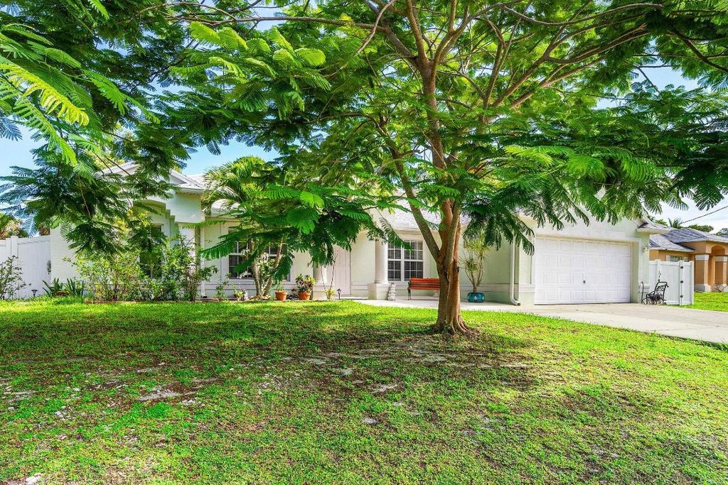 Photo of 1629 SW Fortune Road, Port Saint Lucie, FL 34953 (MLS # R11104611)