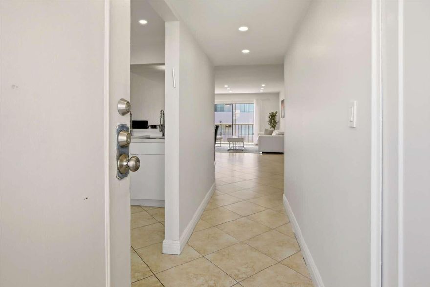 Top-floor 2-bedroom, 2-bath condo with 1,259 sq ft in North Miami Beach. Bright, well-laid-out unit featuring spacious living and dining areas and generously sized bedrooms. Includes assigned parking. HOA covers water, keeping monthly expenses simple. Currently tenant-occupied with flexible lease terms allowing occupancy upon transfer or continued rental use.  Strong opportunity in a highly desirable area with consistent demand. Ideal for primary residence buyers or investors seeking long-term upside.