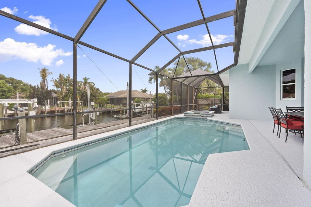 Photo of 117 Queen Elizabeth Court, Hutchinson Island, FL 34949 (MLS # B26041412)