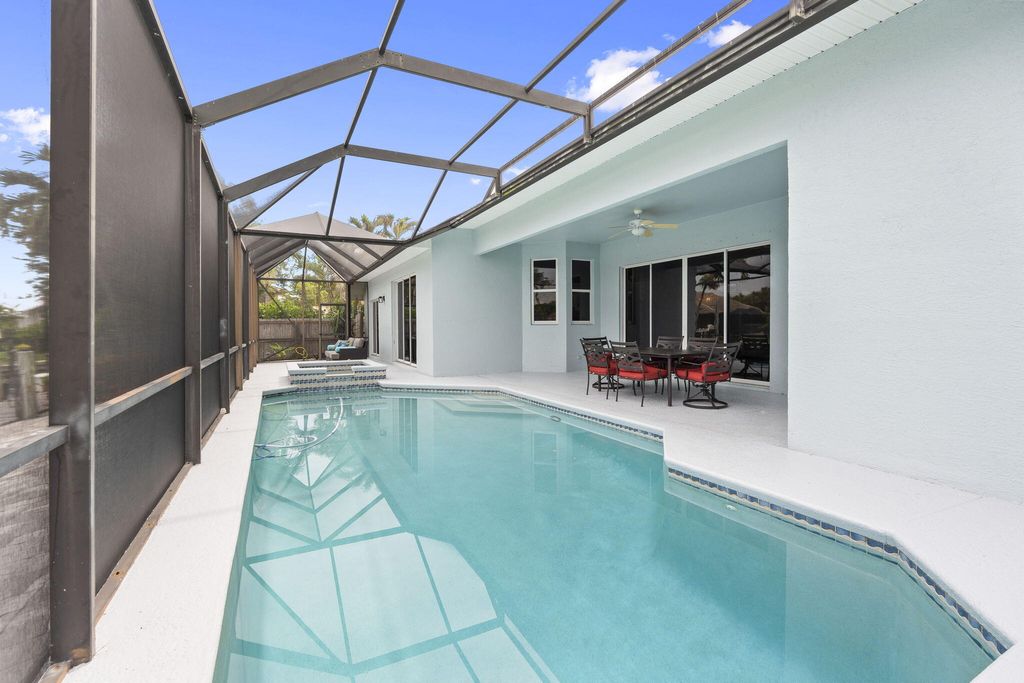 Photo of 117 Queen Elizabeth Court, Hutchinson Island, FL 34949 (MLS # B26041412)