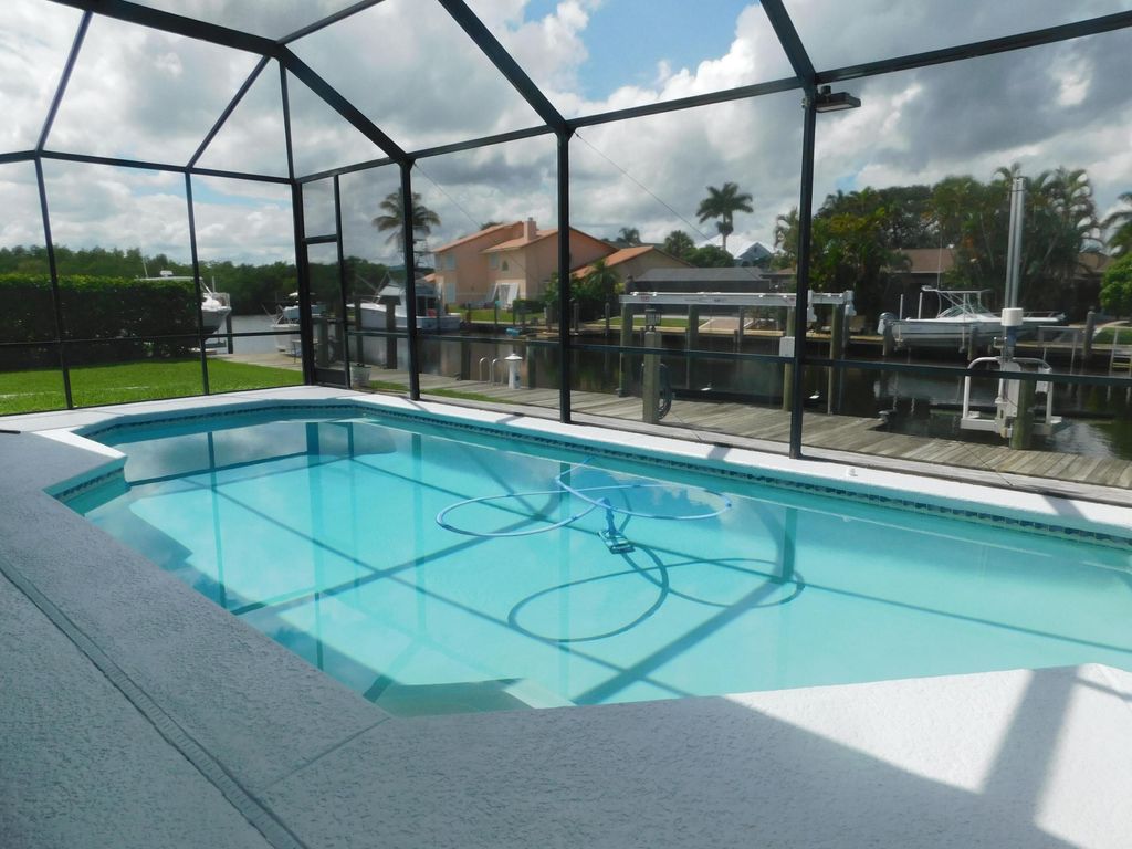 Photo of 117 Queen Elizabeth Court, Hutchinson Island, FL 34949 (MLS # B26041412)