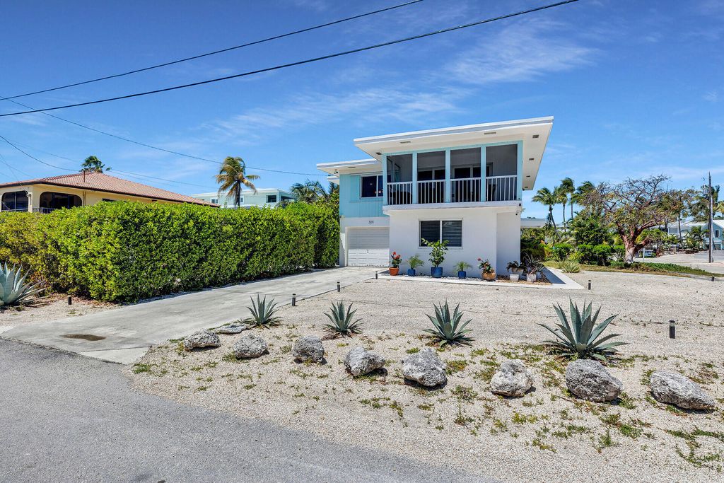 Photo of 309 Jasmine Street, Duck Key, FL 33050 (MLS # B26024105)
