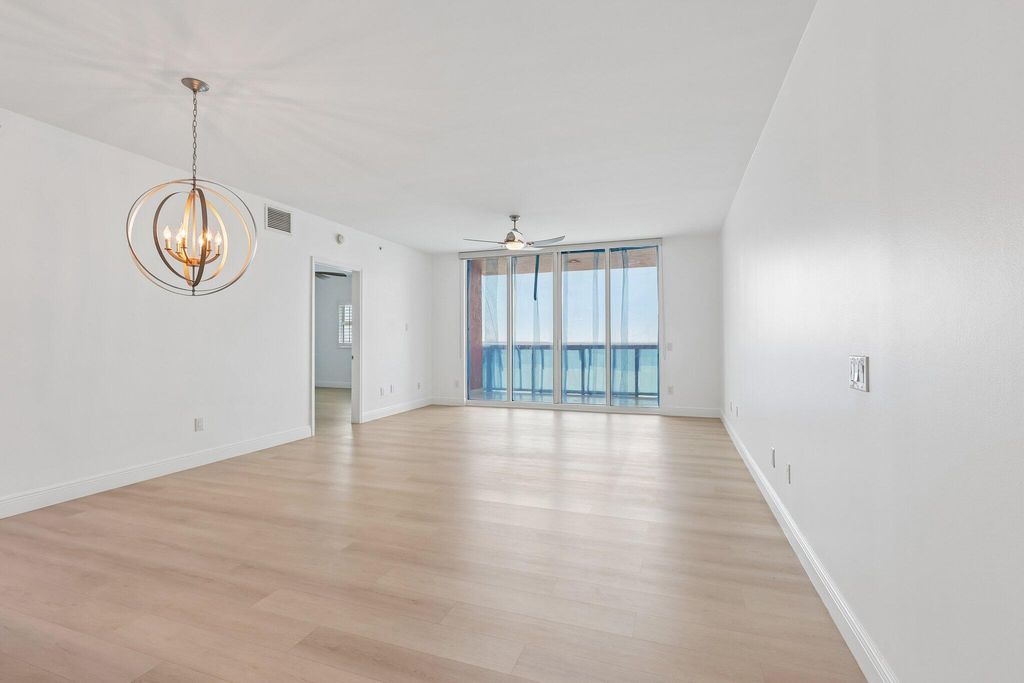 Photo of 2650 Lake Shore Drive #1202, Riviera Beach, FL 33404 (MLS # B26025888)