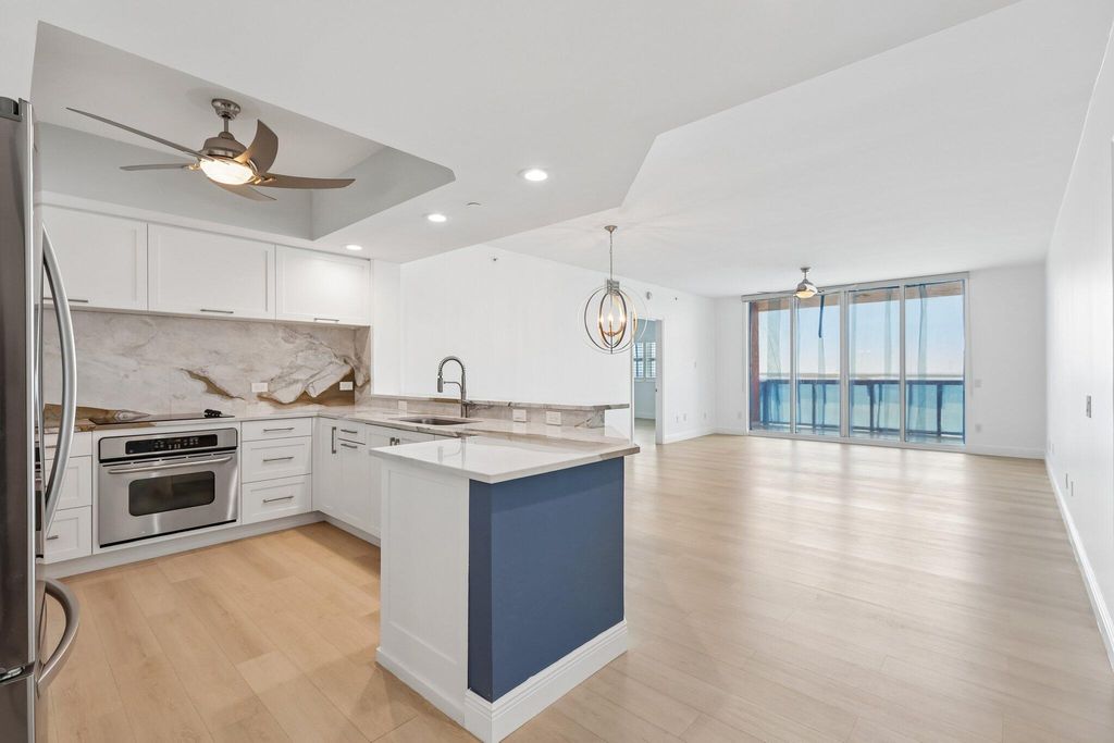 Photo of 2650 Lake Shore Drive #1202, Riviera Beach, FL 33404 (MLS # B26025888)