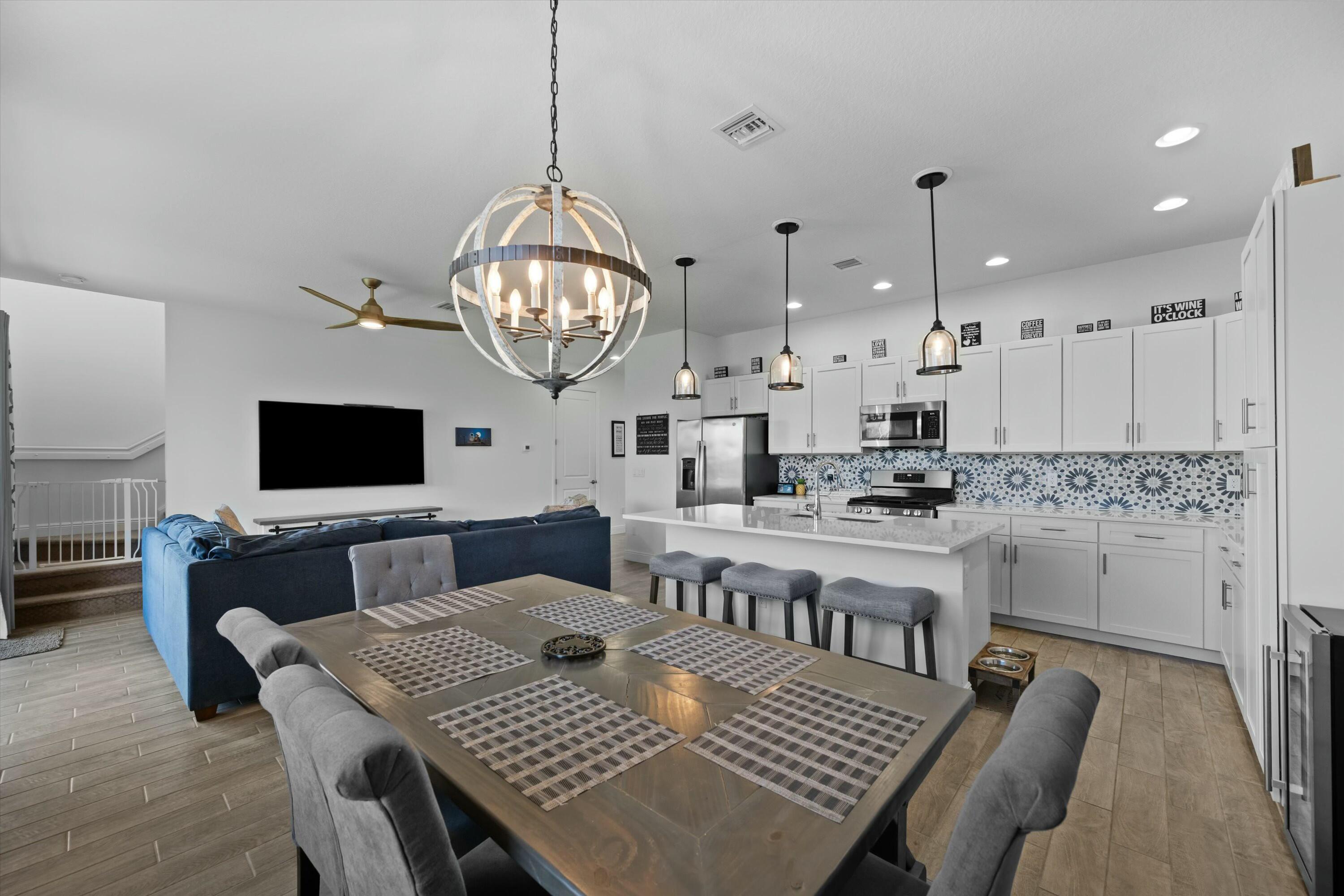 Welcome home to this meticulously maintained Shoreline model, featuring 3 bedrooms, 2.5 bathrooms, 1,705 sqft of elegant living space, and a spacious two-car garage, nestled in the sought-after Skycove community in Westlake, FL. This residence boasts a multitude of desirable upgrades, including beautiful white quartz countertops, stylish wood-look plank tile flooring, and pristine shaker cabinets with upgraded hardware throughout.