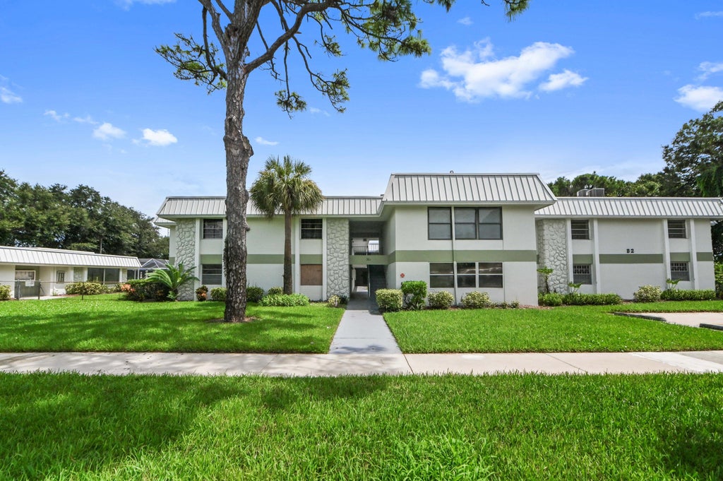 Photo of 2302 SUNRISE Boulevard #206, Fort Pierce, FL 34982 (MLS # B26077431)