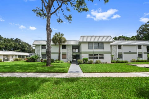 Photo of 2302 SUNRISE Boulevard #206, Fort Pierce, FL 34982 (MLS # B26077431)