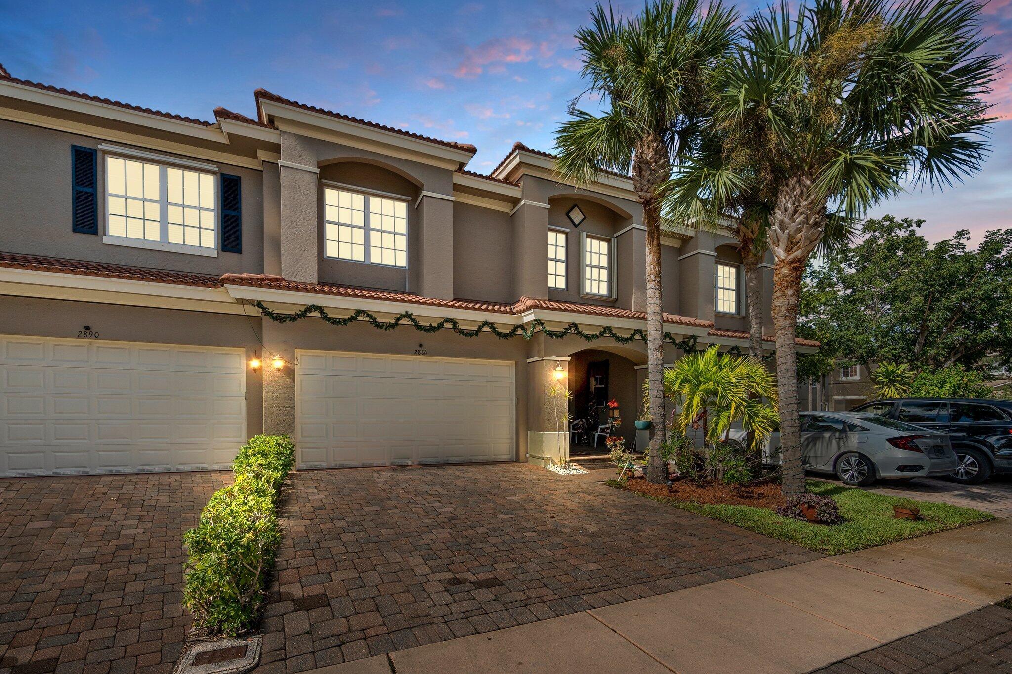 Newport Isles Townhouse (3) bedrooms, (2.5) bathrooms, & a (2) car garage. Plenty of space for the whole family with over 2,100 square feet. The kitchen has granite counters, stainless steel appliances, 42'' cabinets, & a built-in pantry under the stairs for plenty of storage. The 2nd floor has a spacious loft & split bedrooms. Big Master suite with a large walk-in closet. Master bath with dual sinks, jet tub & large shower. The private backyard includes a screened in porch & extended patio area with pavers. Tile floors throughout the main level, wood-like laminate on the upper level, & carpet in the bedrooms. a resort style swimming pool, workout room, tennis courts, basketball courts. Just a short drive to shopping, restaurants, & Cleveland Clinic. One of the most desirable areas of PSL