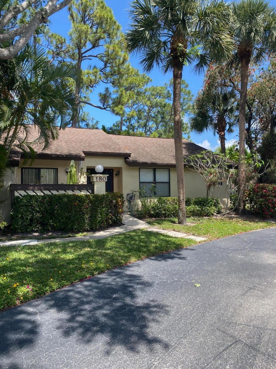 Discover your forever home in the heart of Royal Palm Beach! This delightful end unit is a 2 BR 2 BA (that can easily be convert it into a 3 BR) and is in a lively 55+ community. New 2025 A/C and the master bathroom shower has been updated. Step into the enclosed back patio for morning coffee to start your day. This lovely home just needs your special touch.  Also has a front patio with storage.  Located in the heart of Royal Palm Beach, close to hospitals, shopping, the airport and much more. You can't beat this price!!