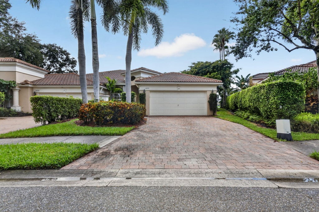 Photo of 2426 SANDY CAY, West Palm Beach, FL 33411 (MLS # B26075332)