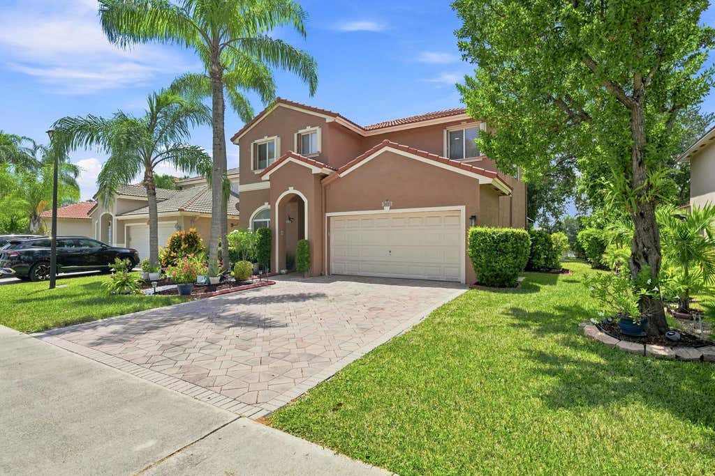 Photo of 5021 PEBBLEBROOK Terrace, Coconut Creek, FL 33073 (MLS # B26067688)