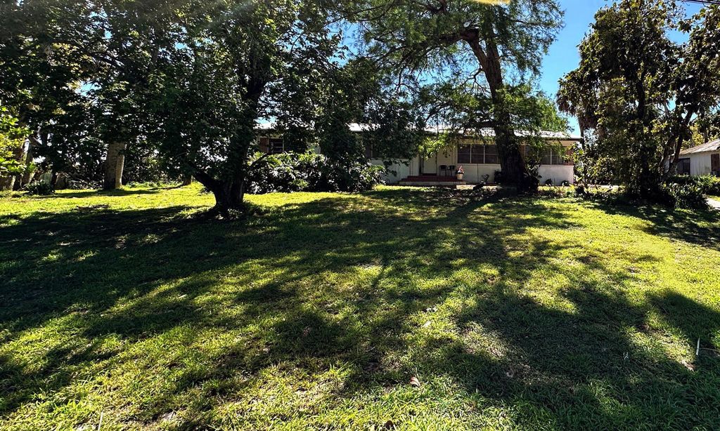 Photo of 2076 E Main Street, Pahokee, FL 33476 (MLS # R11073252)