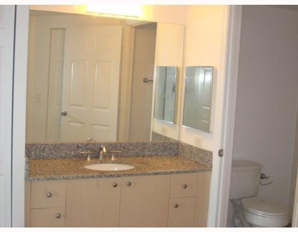 Photo of 2421 Centergate Drive #104, Miramar, FL 33025 (MLS # B26017864)