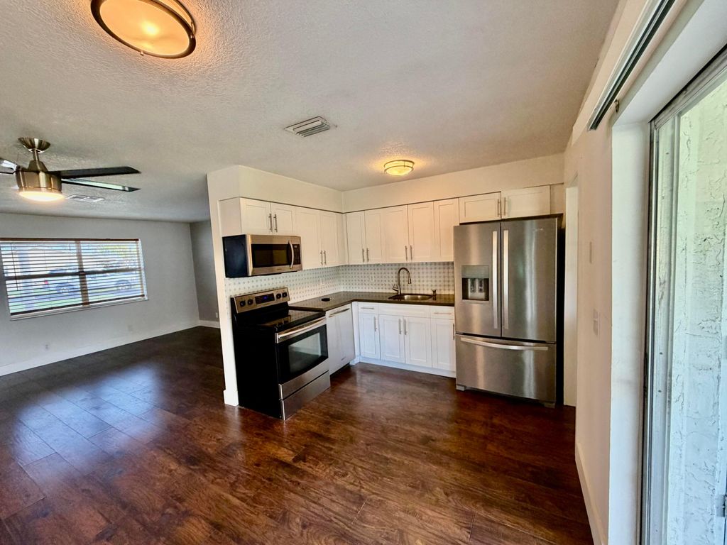 Photo of 2821 Duke Lane, Delray Beach, FL 33445 (MLS # R11165904)