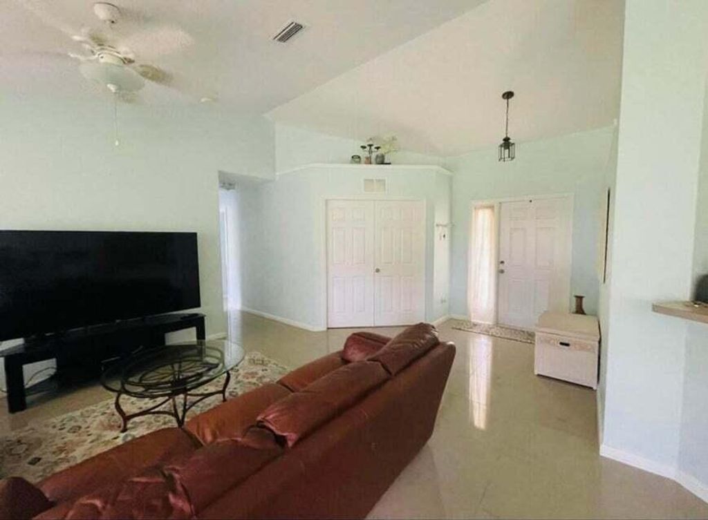 Photo of 442 SE Airview Avenue, Port Saint Lucie, FL 34984 (MLS # R10957992)