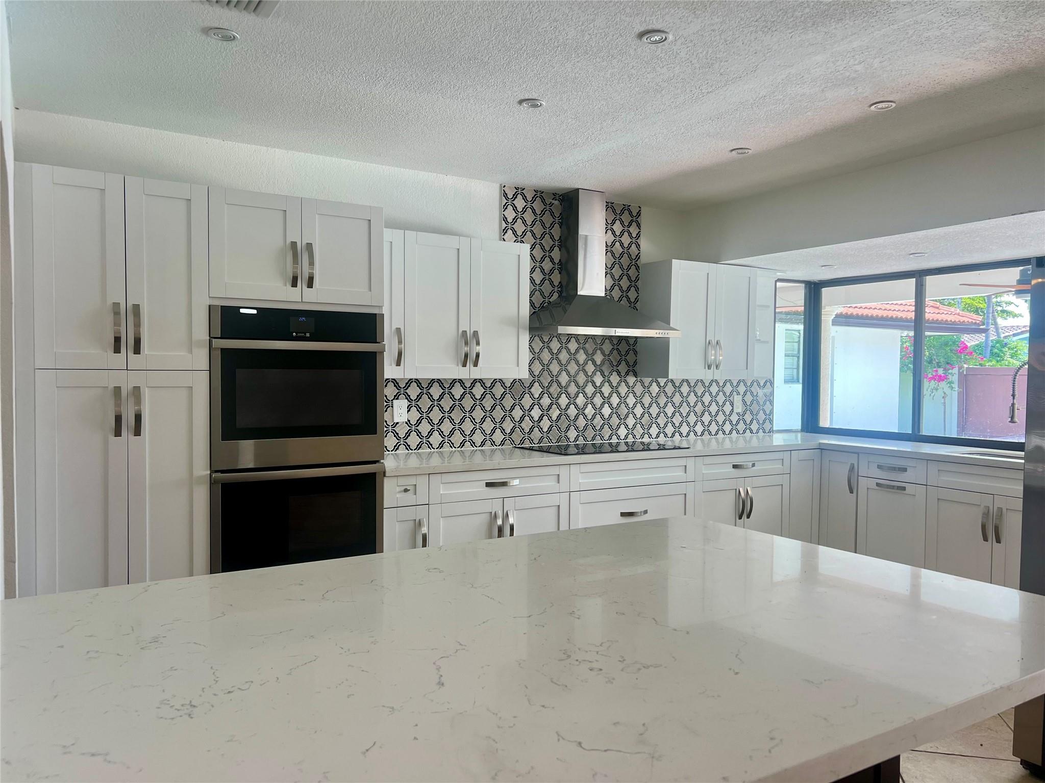 This true 4-bedroom, 3-bath pool home offers over 3,000 sq ft of bright, spacious living with modern upgrades and versatile functionality. The renovated kitchen opens to the family room, creating a warm and connected space for everyday living and entertaining. Enjoy multiple seating areas, a separate laundry room, a large covered patio, and a convenient shed. Perfectly located near houses of worship, parks, and shopping, this home blends comfort, style, and convenience for an exceptional living experience.