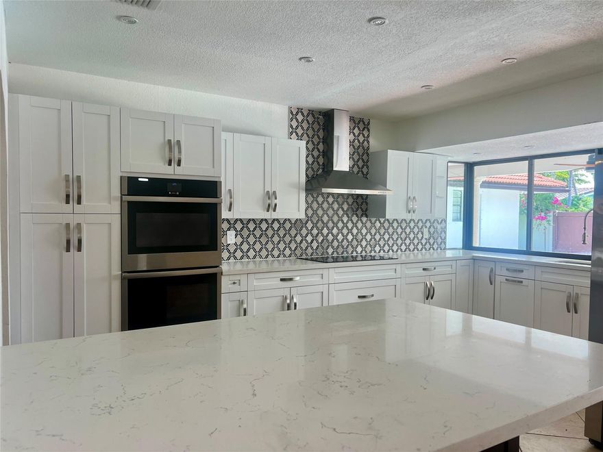 This true 4-bedroom, 3-bath pool home offers over 3,000 sq ft of bright, spacious living with modern upgrades and versatile functionality. The renovated kitchen opens to the family room, creating a warm and connected space for everyday living and entertaining. Enjoy multiple seating areas, a separate laundry room, a large covered patio, and a convenient shed. Perfectly located near houses of worship, parks, and shopping, this home blends comfort, style, and convenience for an exceptional living experience.