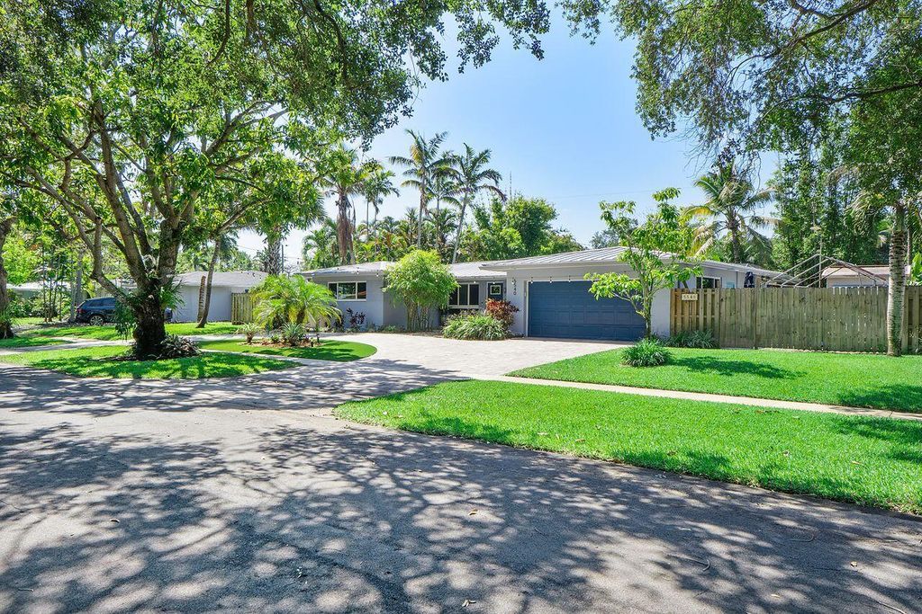 Photo of 5540 SW 3rd Street, Plantation, FL 33317 (MLS # B26021561)