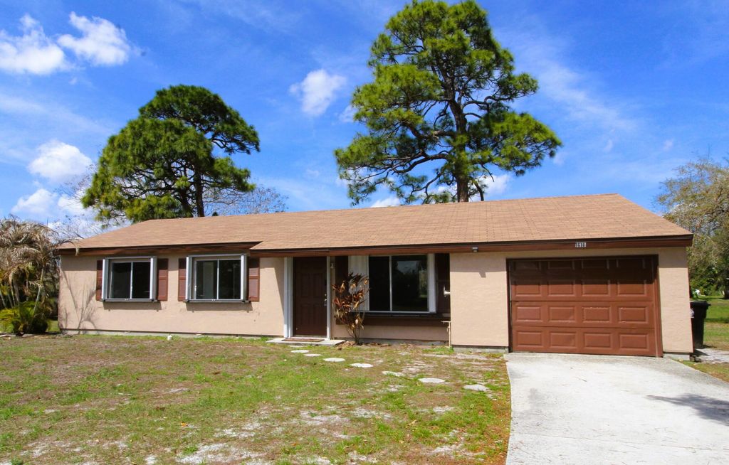 Photo of 1618 SE Elkhart Terrace, Port Saint Lucie, FL 34952 (MLS # B26001947)