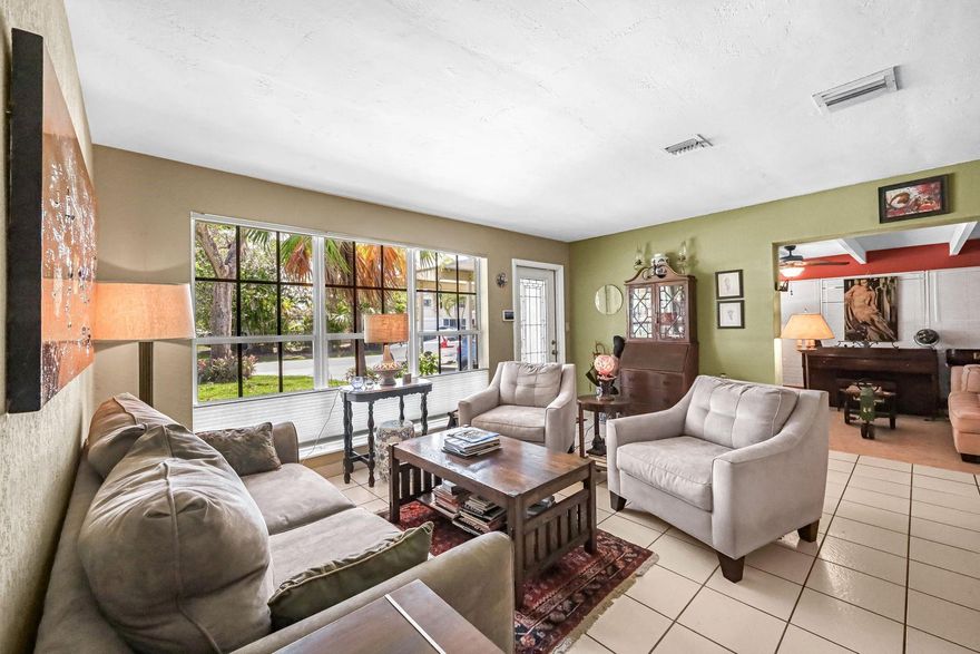 Priced to Sell! Welcome to this charming 3BR/2BA home in the heart of West Wilton Manors, just steps from lively Mickel Park with concerts, sports, and community gatherings. Bright and inviting, the home features granite countertops, central AC, and abundant natural light. Enjoy versatile living with a spacious Florida room, cozy den, and screened patio overlooking a fully fenced backyard—perfect for pets, entertaining, or adding your dream pool. A 1-car carport and a brand-new water heater add convenience. Nestled in a highly desirable neighborhood and only minutes to Wilton Drive’s dining, shopping, and nightlife, this home offers comfort today with endless potential for tomorrow.