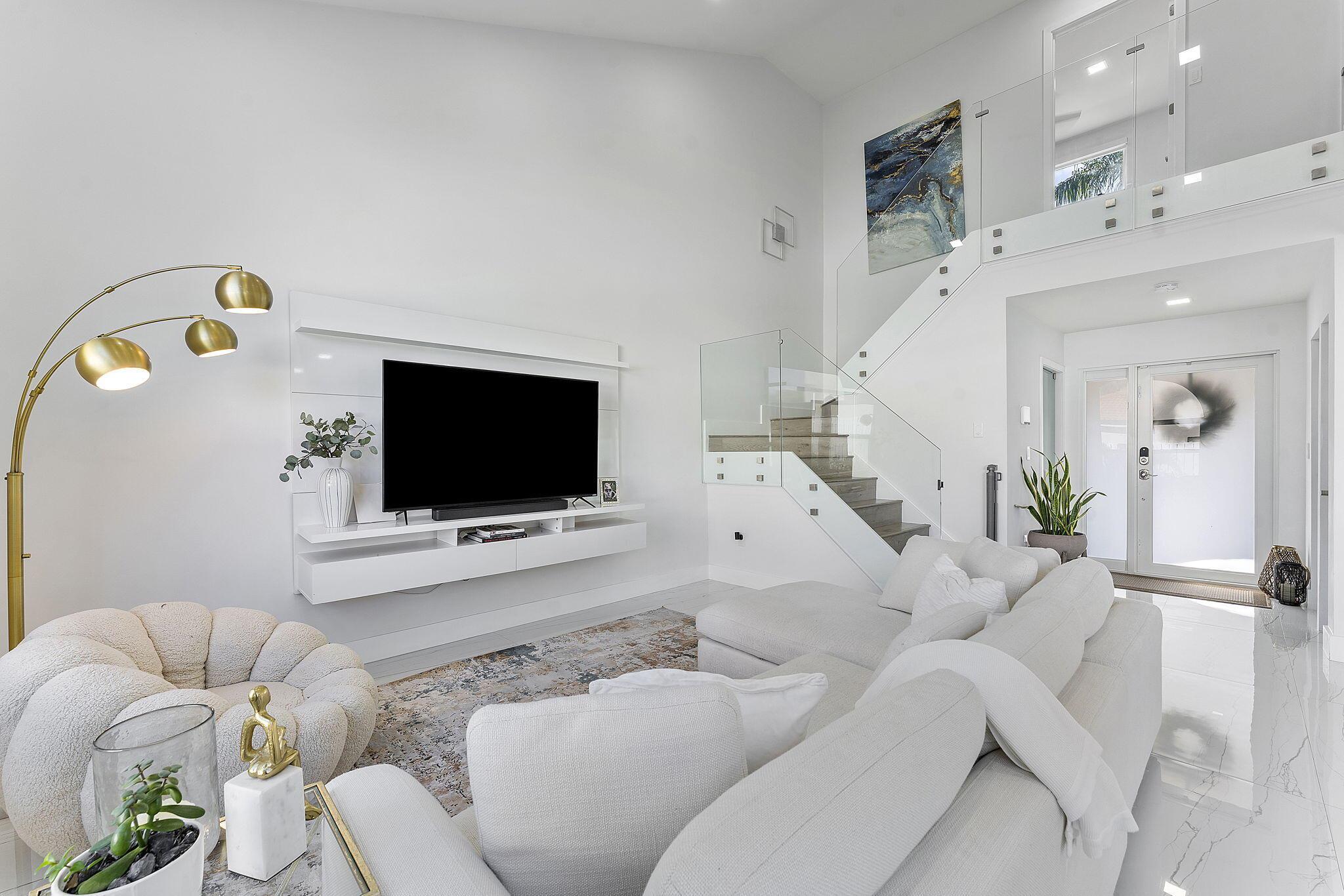 Welcome to this stunning 4-bedroom, 3.5-bath home in the desirable Sawgrass Mills neighborhood of Sunrise. Thoughtfully updated, this home blends modern elegance with everyday comfort. Enjoy a sleek kitchen with stainless steel appliances, spacious living areas filled with natural light, and custom finishes that add a sophisticated touch throughout.The primary suite offers a serene retreat, while stylishly remodeled bathrooms boast premium fixtures and glass accents. Step outside to a private backyard oasis with a paved patio and clean, modern landscaping, perfect for relaxing or entertaining.Built in 1990 and impeccably maintained, this home is conveniently located near top schools, shopping, dining, and major highways. Schedule your private showing today!