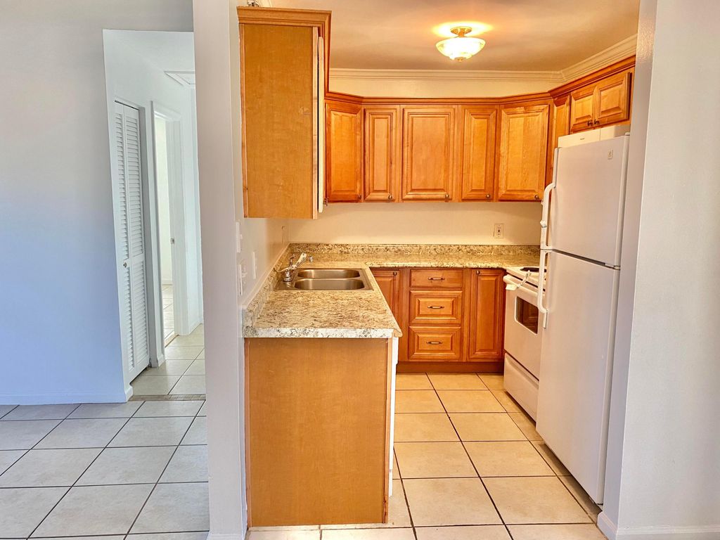 Photo of 456 Glenwood Drive, West Palm Beach, FL 33415 (MLS # R10946038)