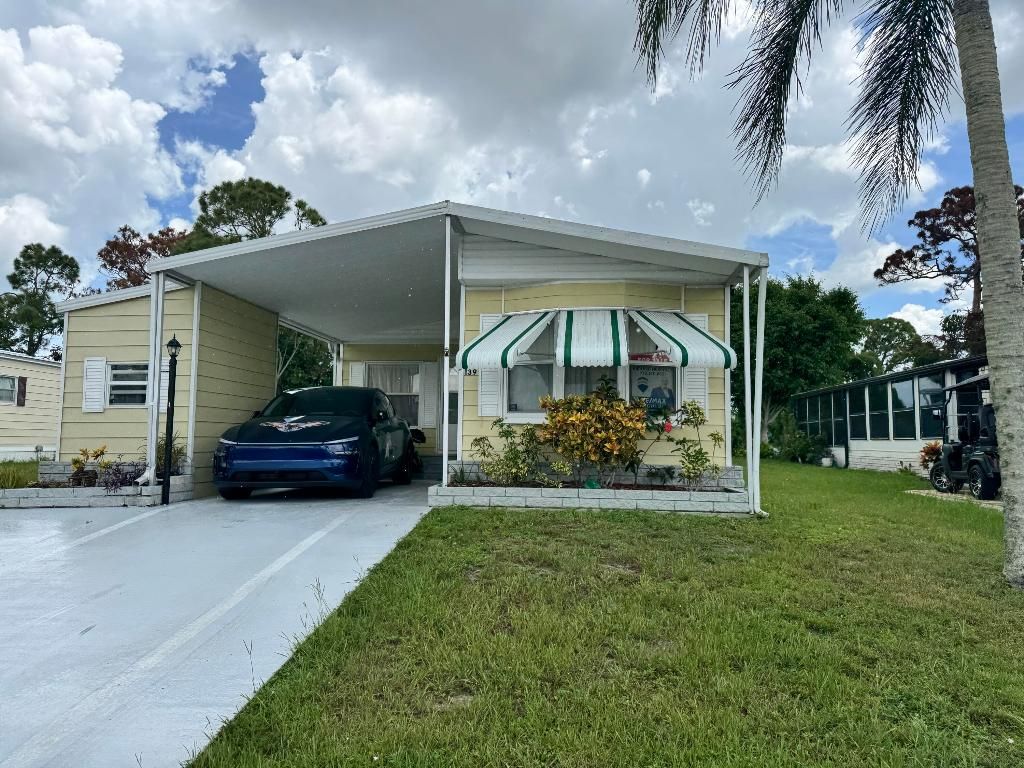Photo of 139 Calle De Lagos, Fort Pierce, FL 34951 (MLS # R11118282)