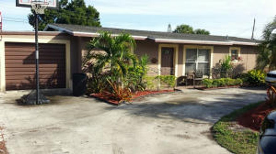 JENSEN BEACH JEWEL! Come and see this tastefully remodeled CBS pool home featuring 3 bedrooms and 2 baths with a 1 car garage and a fenced backyard. Just minutes to Downtown Jensen Beach.The kitchen has granite counter tops with a stone accent back splash, nice cabinetry and a view of the pool through the double doors.The bathrooms have tiled showers and upgraded vanities.The whole house is tiled and painted in neutral colors.The laundry room is very roomy! The back patio and pool area are very private and set up for entertaining.Did I mention the pool is HUGE!This home also features a newer ac unit(2010),pool pump (2010)and roof(2005) Plus a circle driveway for easy road access. Bring you buyers before this one says SOLD!