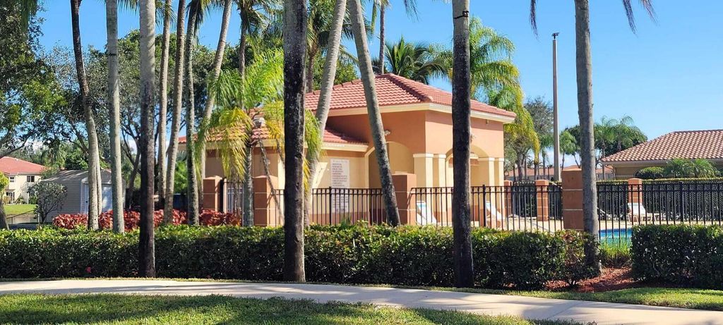 Photo of 3478 Briar Bay 202 Boulevard #202, West Palm Beach, FL 33411 (MLS # R11142136)