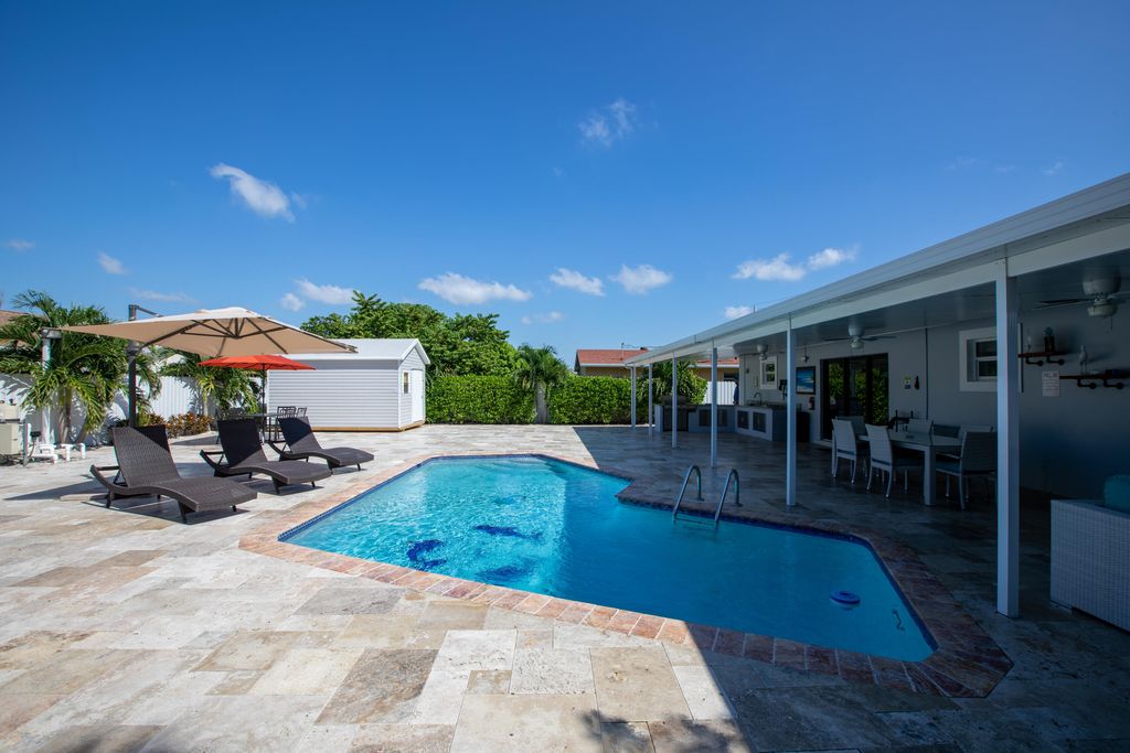 Photo of 1853 S Florida Mango Road, West Palm Beach, FL 33406 (MLS # B26023518)