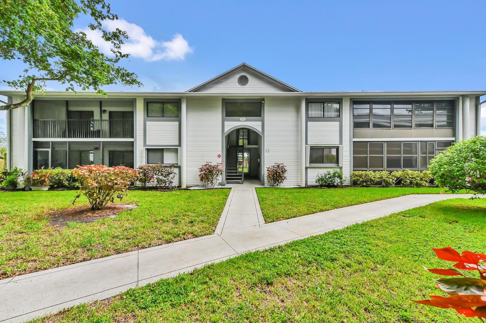 Welcome to this beautifully updated first-floor condo in the desirable Lakes of Delray, a vibrant 55+ community in Delray Beach. This 2-bedroom, 2-bath residence offers comfort, convenience, and a stunning lake view. The primary suite features a spacious walk-in closet and an en-suite bath, while both bathrooms have been tastefully updated. The modern kitchen is complete with granite countertops, stainless steel appliances, and ample storage. A screened Florida room provides the perfect spot to relax and enjoy serene lakefront views. Additional highlights include an in-unit washer and dryer, air conditioning (2011), and hot water heater (2014).