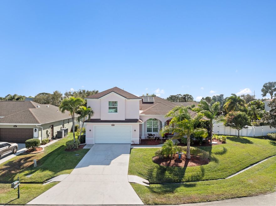 Stunning 2-story pool home featuring 5 bedrooms, 4 full bathrooms with over 2,800 sq ft of living space. Over $100,000 in recent improvements including a 2025 roof, 2025 impact windows, 2025 kitchen remodel with white cabinetry and quartz counters, resurfaced pool deck and a 20kw whole home generator. This home is situated on an oversized .28 acre lot and has a 15x30 feet swimming pool with a lovely waterfall feature. Quiet cul-de-sac location. Home features volume ceilings, crown molding and archways throughout. Split/split floor plan. Primary bedroom suite is on its own side of the home and features tray ceilings, sliders to the lanai, and a spacious master bathroom with 2 walk in closets and built ins. One guest bedroom is located off the kitchen area near a full bathroom. Behind the living room is another bedroom and one full bathroom with a rear access door to the pool area. Upstairs is its own private guest wing, featuring a very large 19x12 bedroom and another 13x13.5 bedroom. Additional walk in closet in the hallway and a full bathroom complete the upstairs. Second story space could be an in-law suite, kid's wing, office space and perfect for multi generational living. The backyard oasis features a recently redone pool deck, storage shed and a fully fenced yard. 2 car garage with epoxy flooring and large under stairs storage room for additional storage. Quiet street near the end of the cul-de-sac. Call today for a private showing.