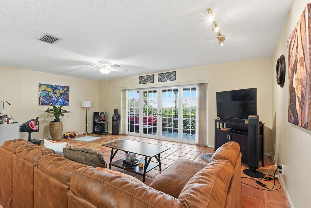 Photo of 2049 NW 45th Avenue, Coconut Creek, FL 33066 (MLS # R11163948)