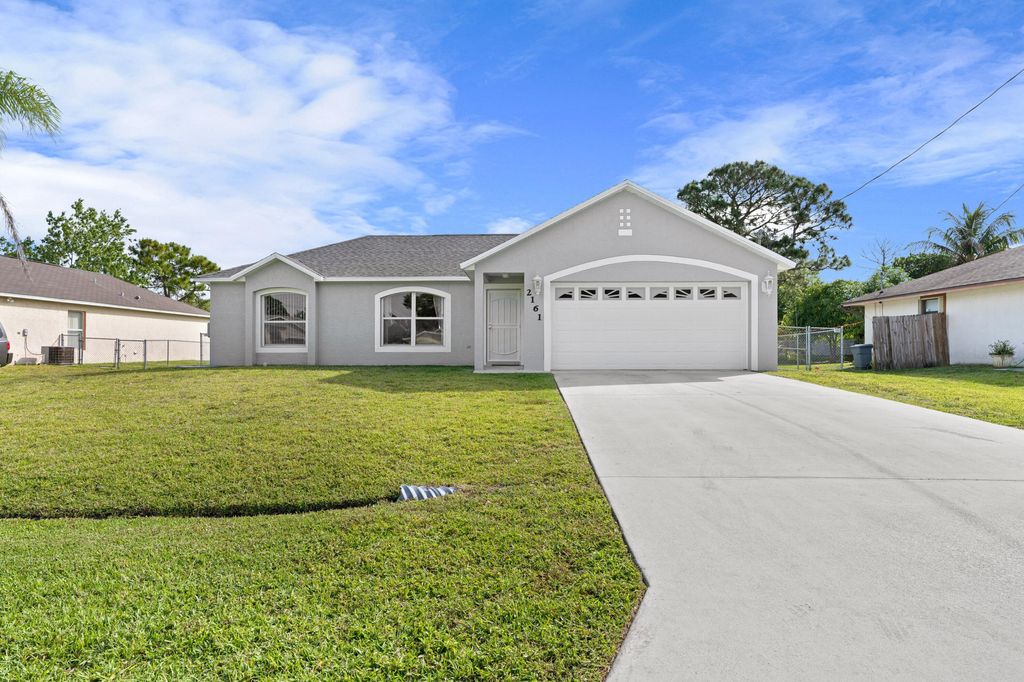 Photo of 2161 SW Burlington Street, Port Saint Lucie, FL 34984 (MLS # R10801196)