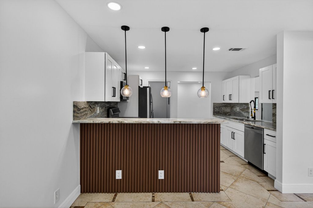 Photo of 6194 Laurel Lane #C, Tamarac, FL 33319 (MLS # B26013019)