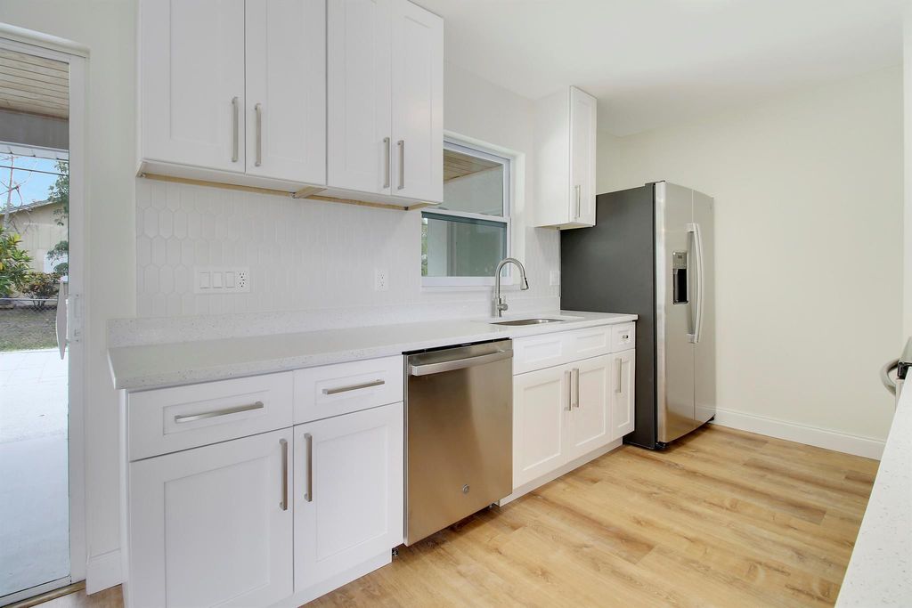 Photo of 2198 SE Harrison Street, Stuart, FL 34997 (MLS # R10977417)