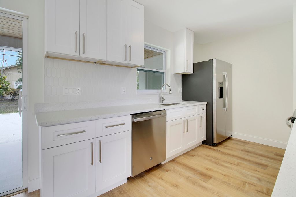 Photo of 2198 SE Harrison Street, Stuart, FL 34997 (MLS # R10977417)