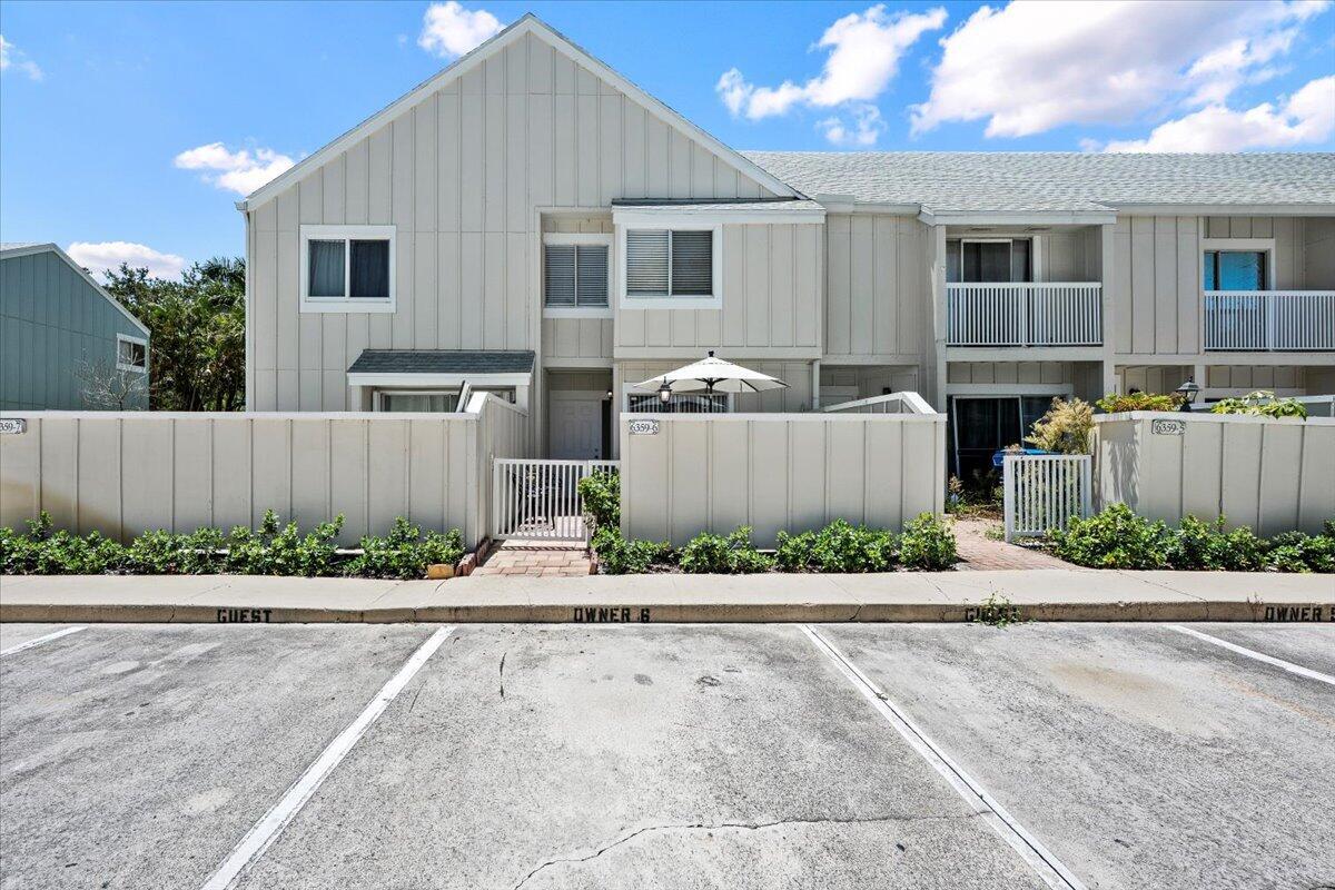 Welcome to this bright, clean, and tastefully updated 2-bedroom, 2.5-bath townhome, ideally located in the highly desirable waterfront community of Riverwalk in Jupiter, FL. This two-story residence offers a thoughtful layout and a host of recent upgrades that make it truly move-in ready. The kitchen was renovated just three years ago with modern Quartz countertops and sleek stainless steel appliances, offering both style and functionality. A full-size washer and dryer are conveniently located just off the kitchen for added ease. Upstairs, both spacious bedrooms feature their own private bathrooms, creating a comfortable and private retreat for all. Enjoy peace of mind with a brand-new roof (2023) and a water heater replaced in 2022. Outdoor living is a breeze with both