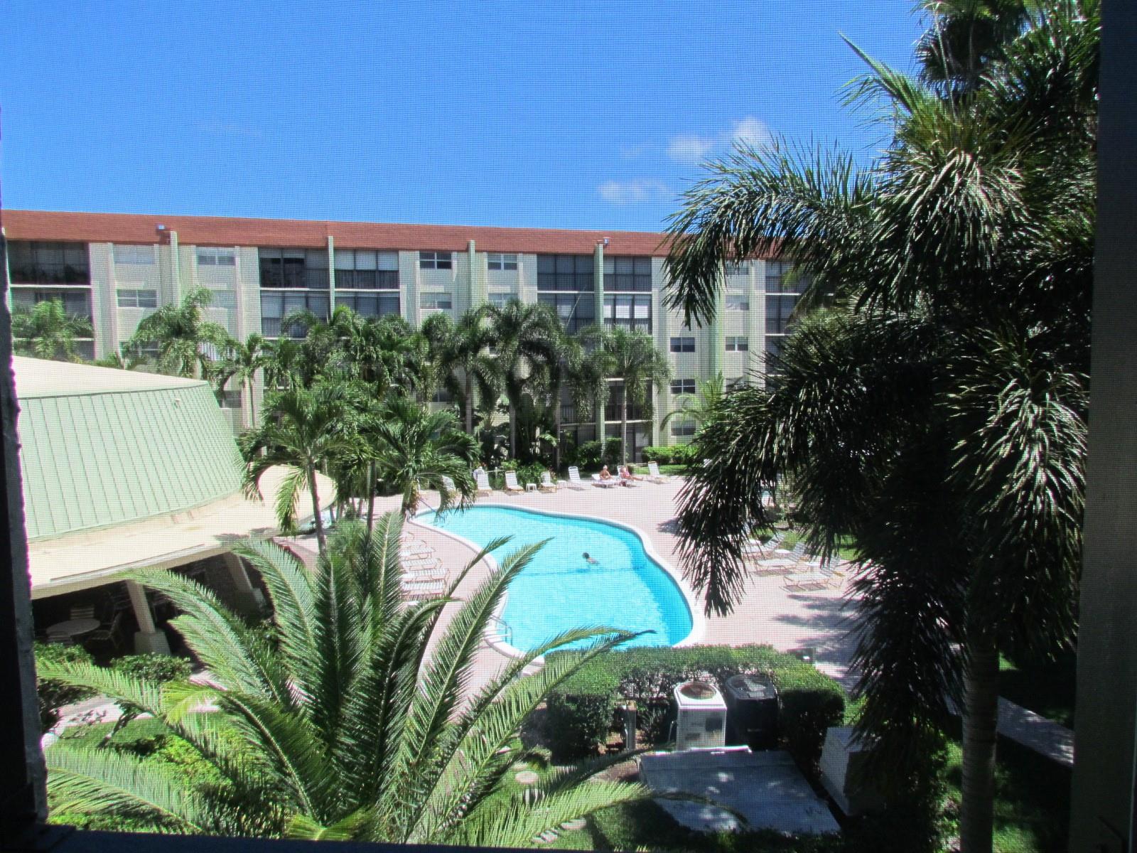 Great location E of Us1 and just minutes to Lauderdale by The Sea. Convenient first floor unit, patio has a door for easy access to the outside area. Rental payment includes cable w/ DVR/HBOMax, fiber optic internet, water, sewer & trash. East of US1 & less than 1.5 miles from beaches. Condo features a split bedroom floor plan, open kitchen designed for maximum space including pantry. Enjoy parking for 2 cars as well as ample guest spaces . Amenities include a tropical pool area with lagoon and waterfall, hot tub, gym, sauna, BBQ, clubhouse.