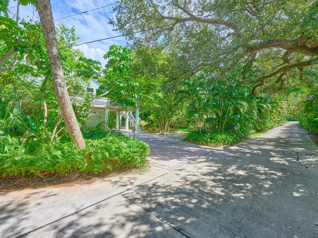 Photo of 1398 SW PALM CITY Road, Stuart, FL 34994 (MLS # B26080543)