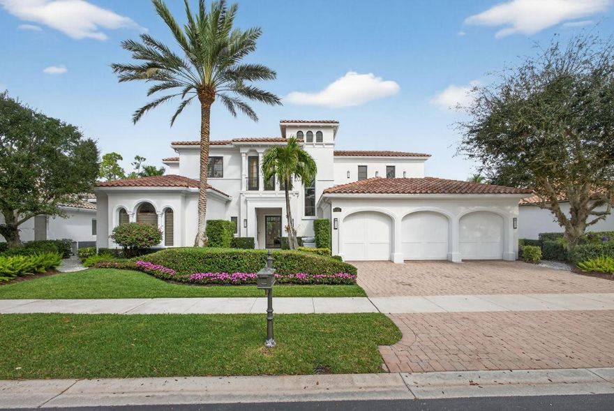 Located on the prestigious estate street of Via Palacio in The Country Club at Mirasol, this extraordinary residence has been completely reimagined with a refined blend of timeless architecture and sleek, couture-level contemporary finishes. Offering approximately 6,700 square feet, a three-car garage, impact windows and doors, and a roof replaced in 2020, this home is designed for the buyer who values dramatic design, elevated craftsmanship, and resort-style indoor-outdoor living. Golf Membership From the moment you enter, the home makes a statement with designer lighting, high-end custom moldings, and beautifully detailed ceilings that create a polished, curated atmosphere. The living room is an immediate showpiece, anchored by a striking floor-to-ceiling black marble fireplace wall, while walls of glass draw your eye straight to the backyard, an unforgettable private oasis framed by tropical landscaping and pool views. Created for entertaining at the highest level, the living room also features a built-in bar, perfectly positioned for cocktail hour and evening gatherings. The entire main living space flows effortlessly for both intimate nights at home and large-scale entertaining.

The formal dining room is an architectural moment, wrapped in elegant custom detailing and crowned by a sculptural ceiling and dramatic designer chandelier. It offers a glamorous yet inviting setting for dinner parties, holiday celebrations, and special occasions.

At the heart of the home is a spectacular chef's kitchen featuring Cristallo quartzite countertops throughout the kitchen and bathrooms, a rare and luminous natural stone that elevates the entire design. Custom cabinetry in sleek contemporary finishes pairs beautifully with a premium appliance suite that includes a Thermador double oven and rangetop with griddle, oversized Sub-Zero refrigerator/freezer, Miele dishwasher, and Sharp microwave drawer, all thoughtfully integrated for a clean, high-end presentation. A beautifully finished butler's pantry adds function and elegance with additional Cristallo quartzite surfaces, custom cabinetry, and a Miele built-in coffee system, creating an ideal space for hosting and everyday convenience.

A glass-front, temperature-controlled wine room with custom racking and an integrated wine cooler provides a dramatic and functional showcase for a curated wine collection, adding another layer of luxury and lifestyle appeal.

The primary suite is spacious, serene, and beautifully appointed, anchored by elegant architectural details and designer lighting. A rare and highly desirable feature of the home is the presence of separate his-and-hers bathrooms, each finished with custom cabinetry, Cristallo quartzite, and a spa-level attention to detail. The suite is completed by a custom dressing area designed to feel both luxurious and highly functional.

The home offers five bedroom suites in total, including three generously sized suites on the second floor, each with its own beautifully finished private bath. A second-floor laundry adds everyday practicality while remaining discreet and thoughtfully designed.

In addition to the bedroom suites, the home includes two powder rooms, one conveniently located near the office and another serving as a cabana bath with direct access to the patio and pool area. Each powder room is finished with striking modern vanities, Cristallo quartzite surfaces, and statement lighting, reinforcing the home's consistent level of design throughout.

A dedicated home theater with tiered seating completes the interior living experience, offering a private and comfortable space for movie nights, sporting events, or relaxed evenings with family and friends.

Outdoor living is exceptional and designed for both beauty and function. The resort-style pool features an elevated water element and expansive stone decking, surrounded by lush tropical landscaping and multiple areas to lounge, dine, and entertain. A unique and memorable detail of the property is the garden inspiration, which was copied from Marie Antoinette's Palace in France and reflected in the formal, symmetrical layout and manicured design, creating a breathtaking backdrop that feels both elegant and rare. The covered loggia features graceful arches, a modern ceiling fan, and a built-in summer kitchen, making it an ideal setting for outdoor dining and relaxed evenings overlooking the pool.

The home may be sold fully furnished, excluding artwork. Furnishings are not included in the list price and may be purchased separately. Golf Membership