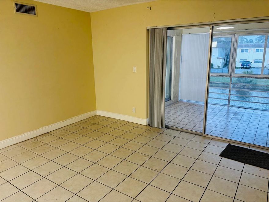 GREAT SPACIOUS UNIT SECOND ROOM CONVERTED IN TO A BEDROOM NICE KITCHEN TILE FLOORS ALL THROUGHOUT, GREAT LOCATION, EASY TO MOVE IN