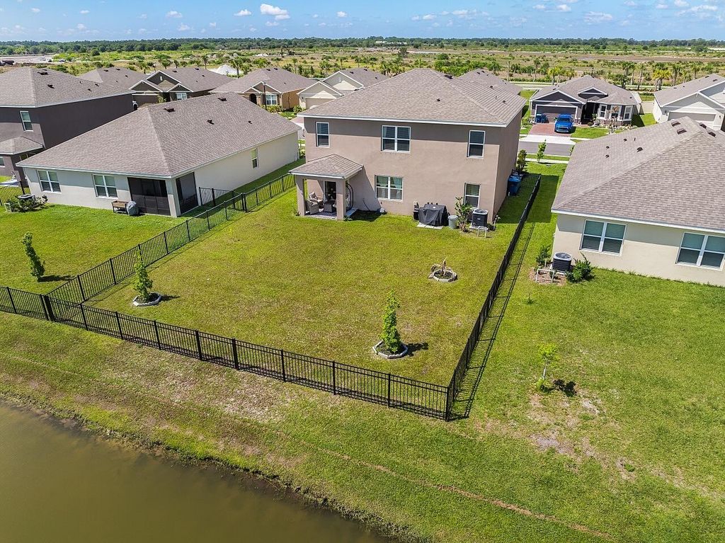 Photo of 1046 Dugan Circle SE, Palm Bay, FL 32909 (MLS # B26024246)