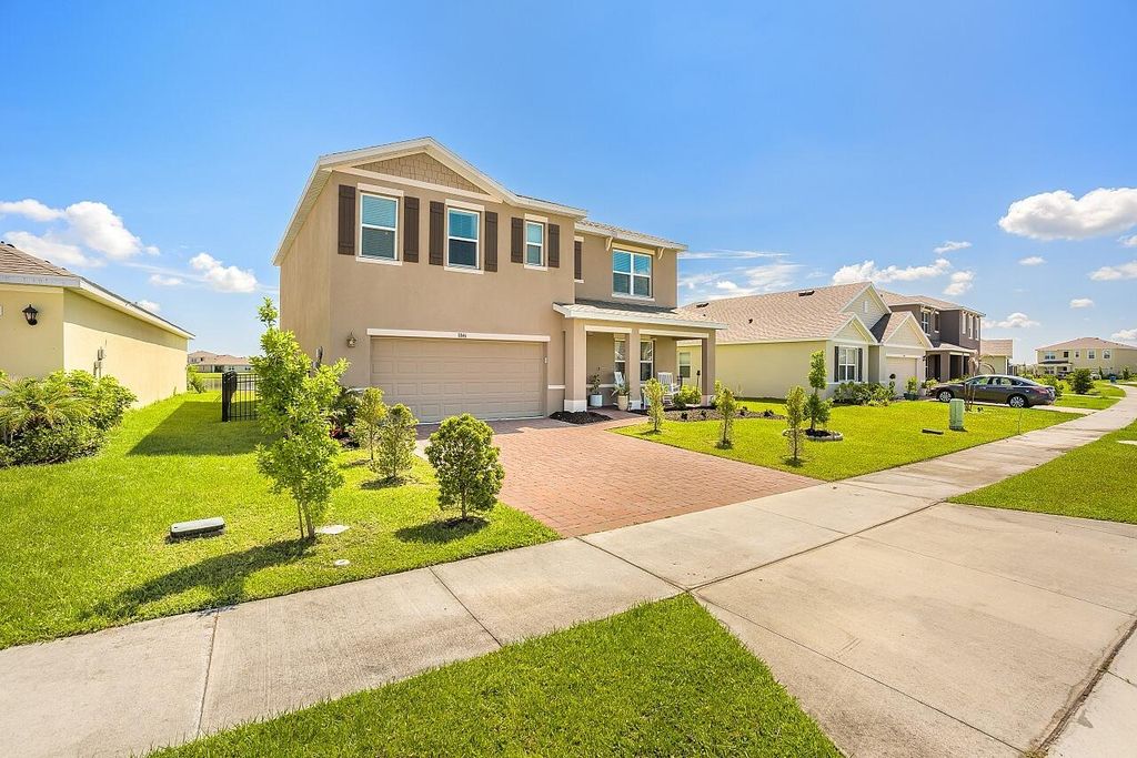 Photo of 1046 Dugan Circle SE, Palm Bay, FL 32909 (MLS # B26024246)