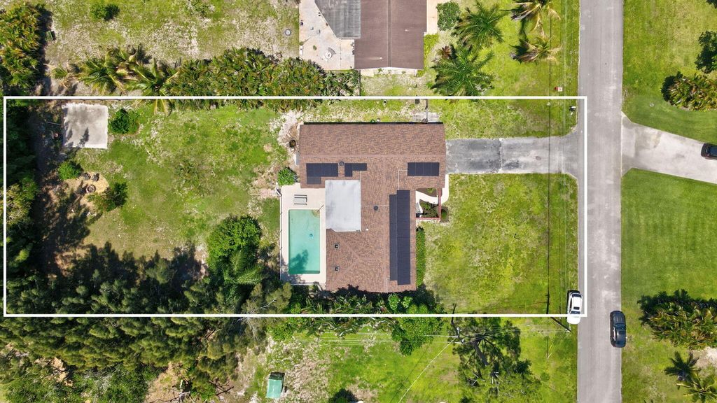 Photo of 128 Barberton Road, Lake Worth, FL 33467 (MLS # B26022737)