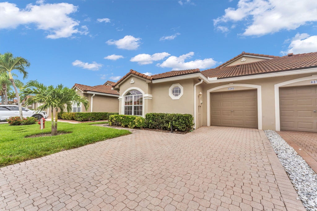Photo of 8385 VÃ­a Serena, Boca Raton, FL 33433 (MLS # B26037306)