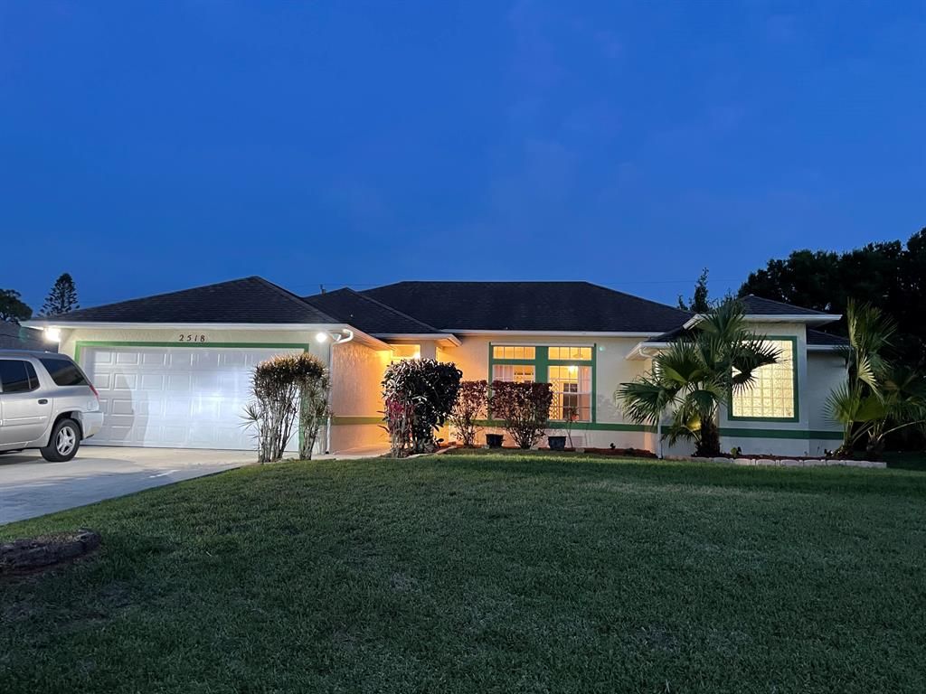 Photo of 2518 SW Grotto Circle, Port Saint Lucie, FL 34953 (MLS # R10708876)